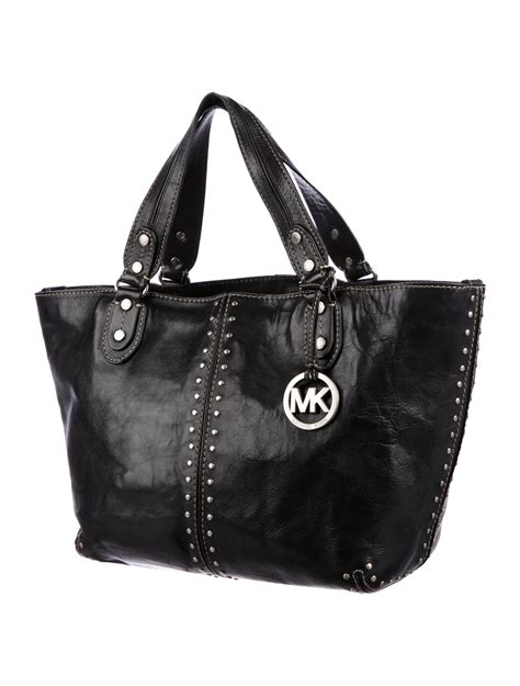 michael kors black purse with studs|michael kors black shoulder handbags.